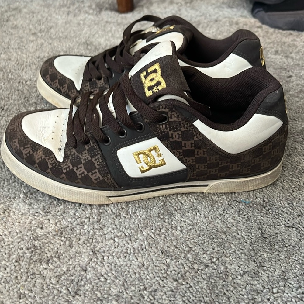 Brown and gold DC shoes